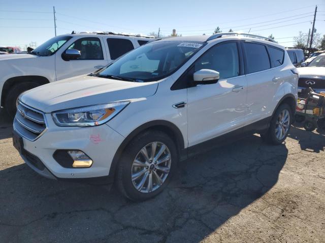 FORD ESCAPE TIT 2018 with VIN 1FMCU9J97JUC35987 - Photo from auction
