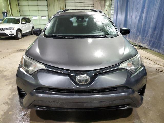Photo 5 from auction – 2018 TOYOTA RAV4 LE with VIN JTMZFREV0JJ160101