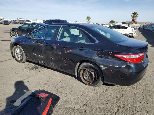 Photo 2 from auction – 2016 TOYOTA CAMRY HYBR with VIN 4T1BD1FK8GU184825