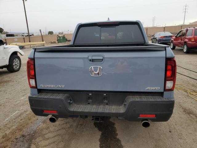 Photo 6 from auction – 2023 HONDA RIDGELINE with VIN 5FPYK3F77PB042820