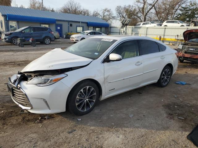 TOYOTA AVALON HYB 2016 with VIN 4T1BD1EB1GU057092 - Photo from auction