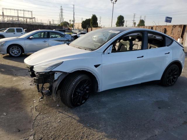 TESLA MODEL Y 2022 with VIN 7SAYGAEE7NF409018 - Photo from auction