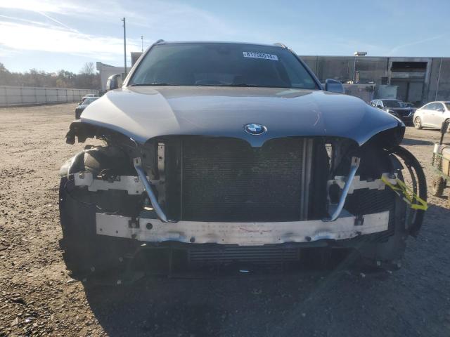 Photo 5 from auction – 2015 BMW X5 XDRIVE3 with VIN 5UXKR0C51F0P16743