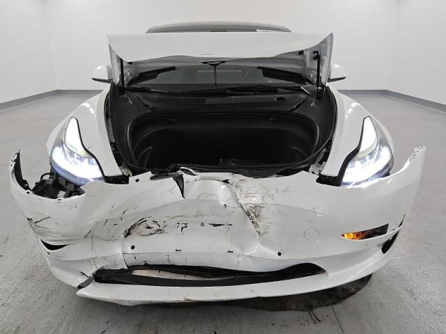 Photo 5 from auction – 2022 TESLA MODEL 3 with VIN 5YJ3E1EA2NF290109