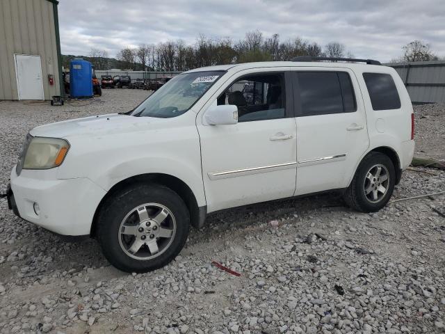 HONDA PILOT TOUR 2010 with VIN 5FNYF4H91AB030705 - Photo from auction