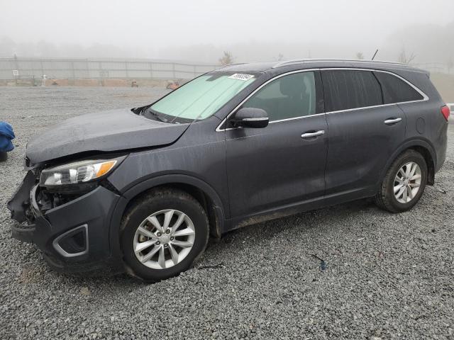 KIA SORENTO LX 2016 with VIN 5XYPG4A35GG185161 - Photo from auction