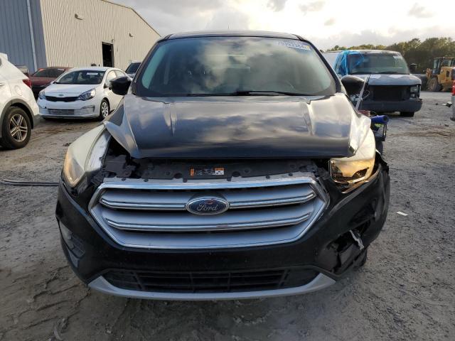 Photo 5 from auction – 2017 FORD ESCAPE SE with VIN 1FMCU0G92HUA28579