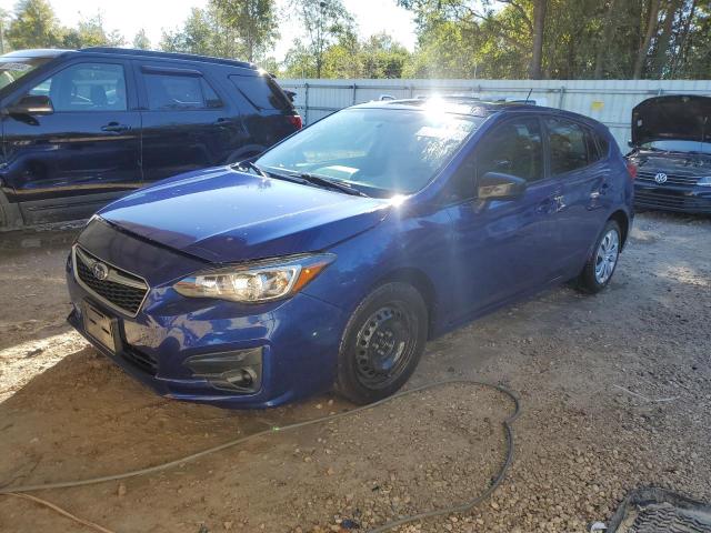 SUBARU IMPREZA 2018 with VIN 4S3GTAA63J3734825 - Photo from auction
