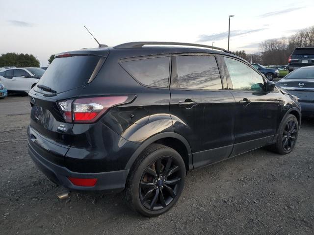 Photo 3 from auction – 2017 FORD ESCAPE SE with VIN 1FMCU9GD5HUD23703