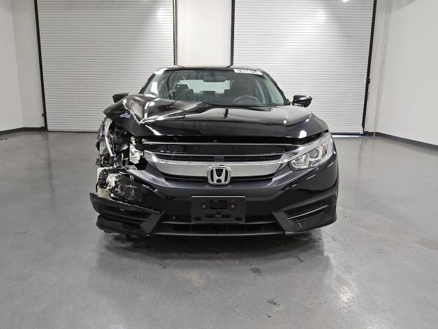 Photo 5 from auction – 2018 HONDA CIVIC LX with VIN 2HGFC2F50JH508600