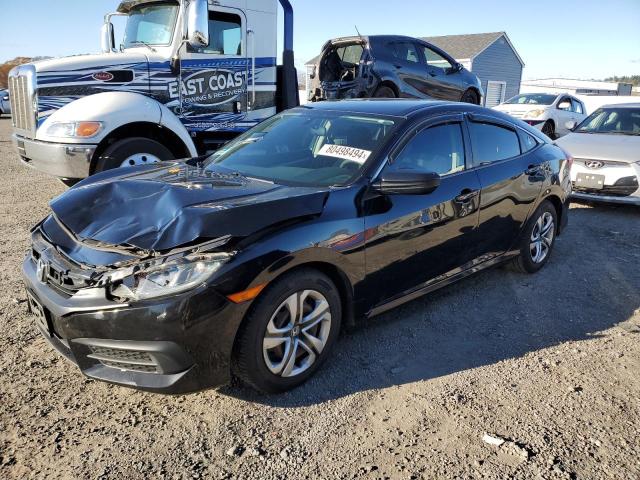 Photo 1 from auction – 2018 HONDA CIVIC LX with VIN 19XFC2F58JE201654