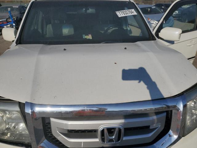 Фото 12 с аукциона – 2011 HONDA PILOT TOUR с VIN 5FNYF4H92BB069322