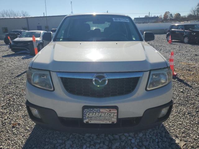 Photo 5 from auction – 2011 MAZDA TRIBUTE I with VIN 4F2CY0C71BKM06133