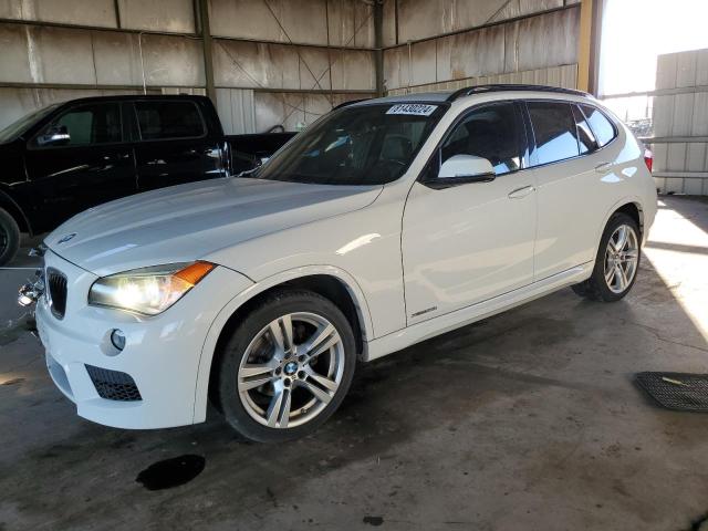 BMW X1 XDRIVE2 2014 with VIN WBAVL1C52EVY11414 - Photo from auction