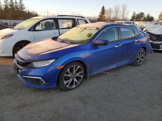 HONDA CIVIC TOUR 2019 with VIN 2HGFC1F95KH102004 - Photo from auction