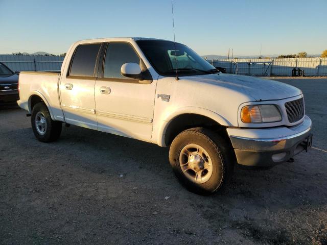 Photo 4 from auction – 2003 FORD F150 SUPER with VIN 1FTRW08L53KD35199