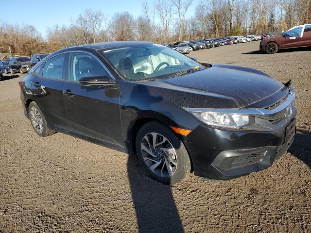 Photo 4 from auction – 2018 HONDA CIVIC EX with VIN 2HGFC2F74JH528012