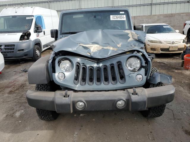 Photo 5 from auction – 2015 JEEP WRANGLER U with VIN 1C4BJWDG8FL712473