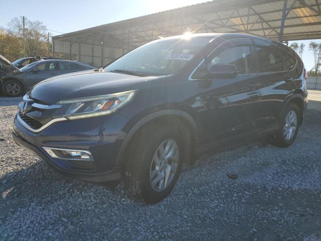HONDA CR-V EX 2015 with VIN 3CZRM3H57FG710699 - Photo from auction