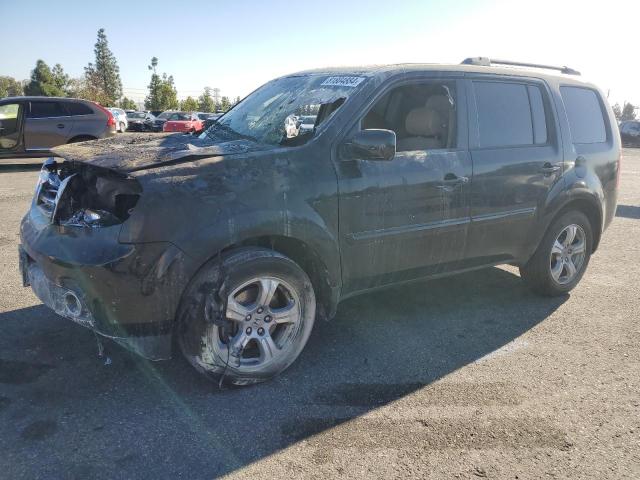 HONDA PILOT EXL 2014 with VIN 5FNYF3H52EB011478 - Photo from auction