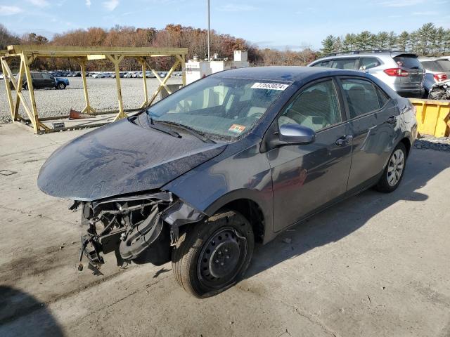TOYOTA COROLLA L 2014 with VIN 5YFBURHE3EP137738 - Photo from auction