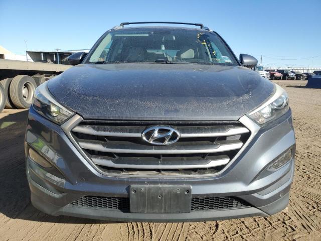Photo 5 from auction – 2017 HYUNDAI TUCSON LIM with VIN KM8J3CA49HU252103