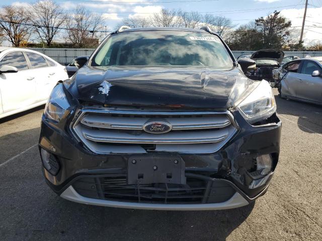 Photo 5 from auction – 2019 FORD ESCAPE TIT with VIN 1FMCU0J90KUA55831