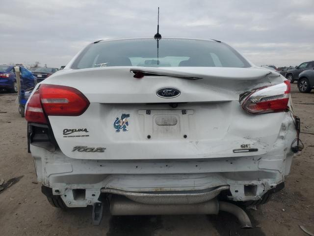 Снимка 6 от търг – 2016 FORD FOCUS SE с VIN 1FADP3F24GL327961