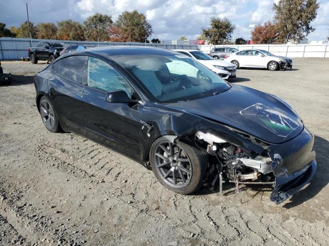 Photo 4 from auction – 2021 TESLA MODEL 3 with VIN 5YJ3E1EA5MF928786
