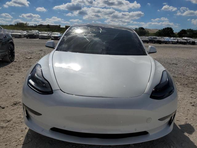 Photo 5 from auction – 2021 TESLA MODEL 3 with VIN 5YJ3E1EAXMF020608