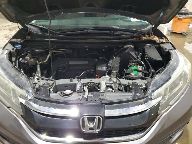 Photo 12 from auction – 2015 HONDA CR-V LX with VIN 2HKRM4H31FH613452