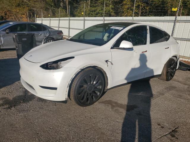 TESLA MODEL Y 2022 with VIN 7SAYGDEF0NF328775 - Photo from auction