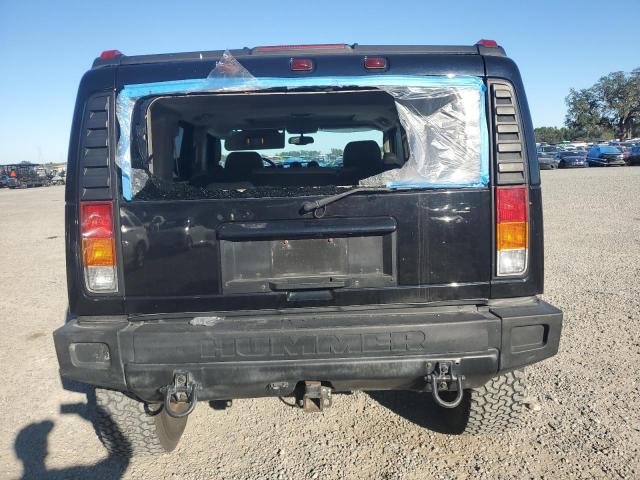 Photo 6 from auction – 2003 HUMMER H2 with VIN 5GRGN23UX3H136571