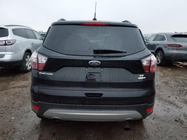 Photo 6 from auction – 2018 FORD ESCAPE SE with VIN 1FMCU9GD9JUD16260