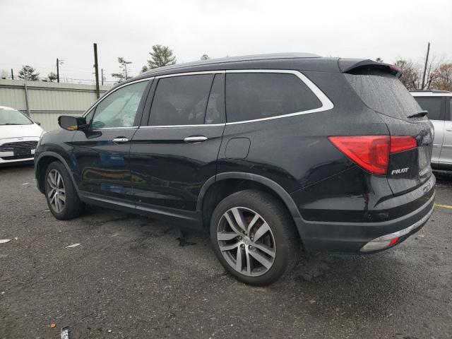 Photo 2 from auction – 2016 HONDA PILOT with VIN 5FNYF6H99GB088873