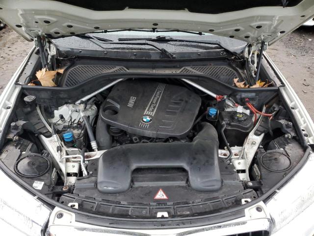 Photo 12 from auction – 2014 BMW X5 XDRIVE3 with VIN 5UXKS4C56E0J95769