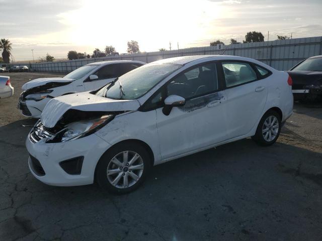 FORD FIESTA SE 2013 with VIN 3FADP4BJ0DM137183 - Photo from auction