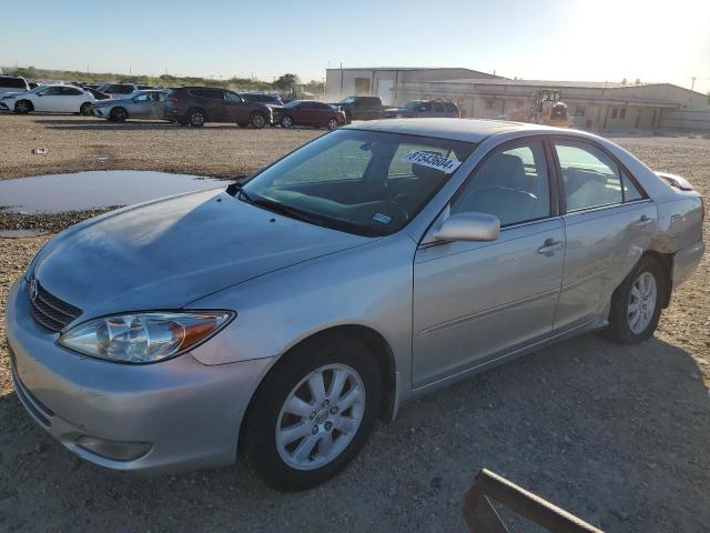 TOYOTA CAMRY LE 2003 with VIN 4T1BF32KX3U060352 - Photo from auction