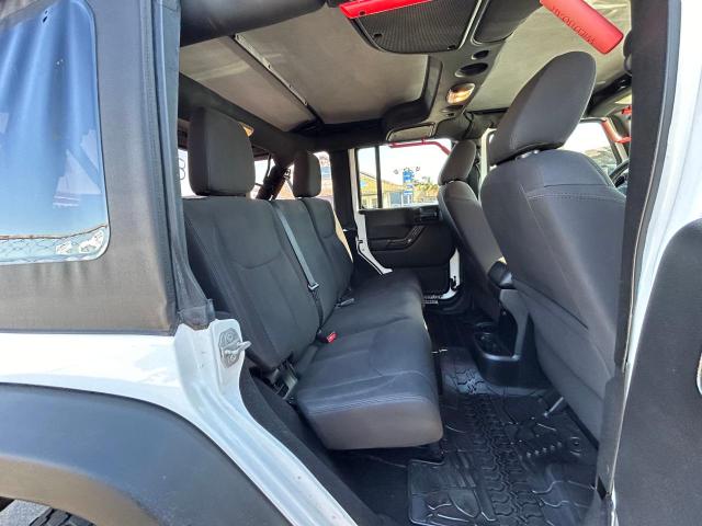 Photo 6 from auction – 2015 JEEP WRANGLER U with VIN 1C4BJWDG4FL739735