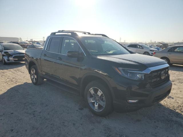 Photo 4 from auction – 2024 HONDA RIDGELINE with VIN 5FPYK3F54RB021974