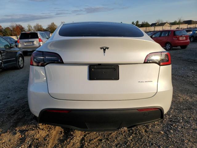 Photo 6 from auction – 2023 TESLA MODEL Y with VIN 7SAYGDEE1PF868159