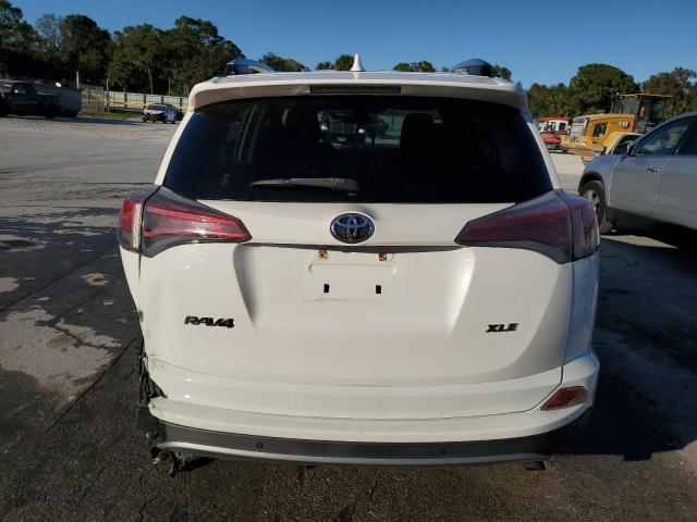 Photo 6 from auction – 2017 TOYOTA RAV4 XLE with VIN JTMWFREV1HD099157