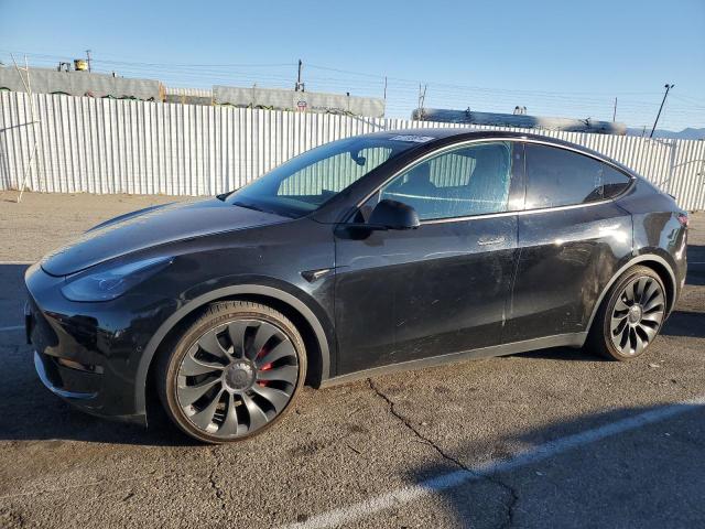 TESLA MODEL Y 2022 with VIN 7SAYGDEF2NF554039 - Photo from auction