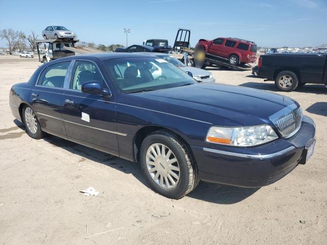 Photo 4 from auction – 2004 LINCOLN TOWN CAR E with VIN 1LNHM81W44Y633015
