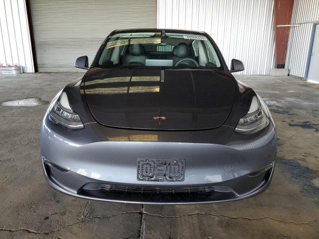 Photo 5 from auction – 2021 TESLA MODEL Y with VIN 5YJYGAEE4MF306439