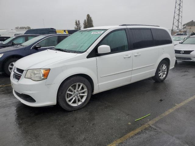 DODGE GRAND CARA 2014 with VIN 2C4RDGCG9ER391515 - Photo from auction
