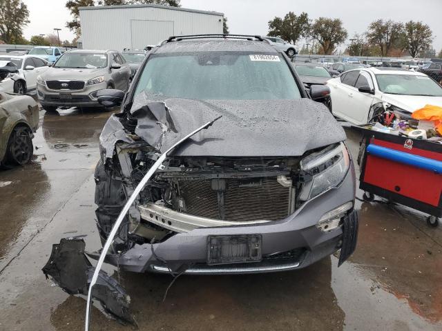 Photo 5 from auction – 2017 HONDA PILOT TOUR with VIN 5FNYF6H91HB040267