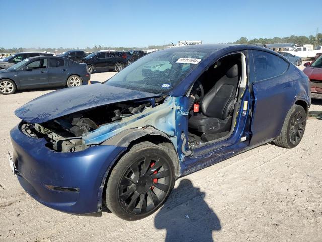 TESLA MODEL Y 2022 with VIN 7SAYGDEE5NF343232 - Photo from auction