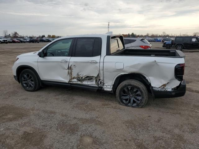 Photo 2 from auction – 2021 HONDA RIDGELINE with VIN 5FPYK3F10MB501662