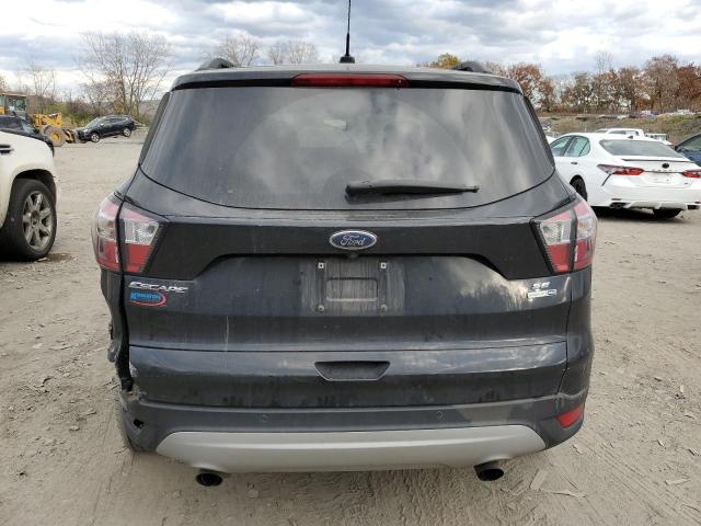 Photo 6 from auction – 2017 FORD ESCAPE SE with VIN 1FMCU9GD1HUD48100